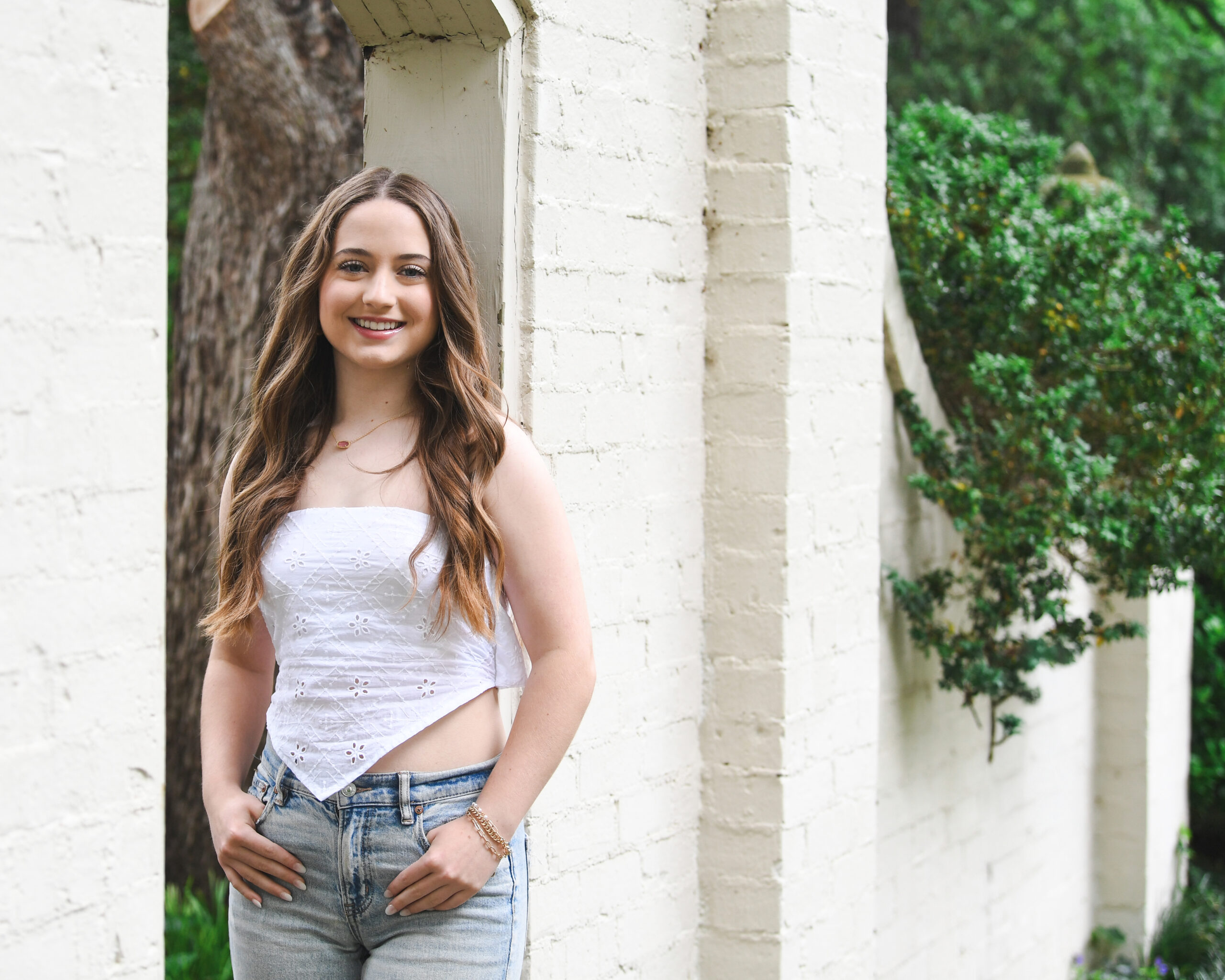 white brick wall high school senior